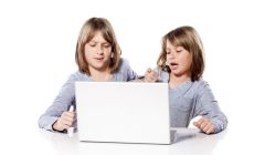 kids fighting over laptop
