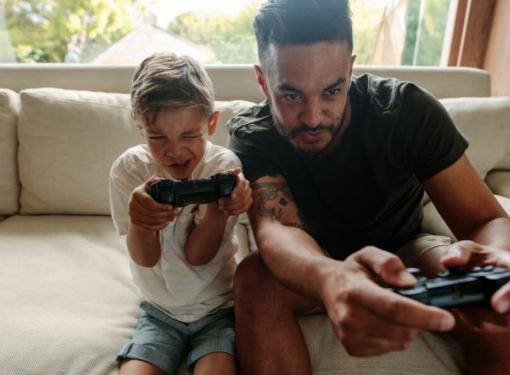 Dad_and_son_playing_video_games.jpg