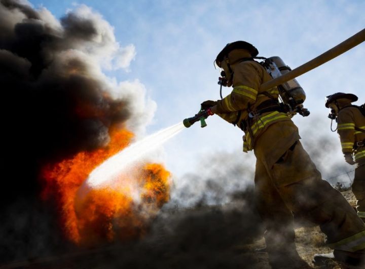 firefighters battle a blaze