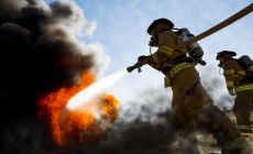 firefighters battle a blaze